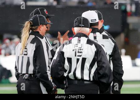 EAST RUTHERFORD, NJ - DECEMBER 22: The Officials huddle during the National  Football League game between the New York Jets and the Jacksonville Jaguars  on December 22, 2022 at MetLife Stadium in