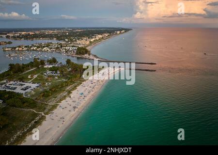 High angle view of crowded Nokomis beach in Sarasota County, USA. Many people enjoing vacations time swimming in ocean water and relaxing on warm Stock Photo