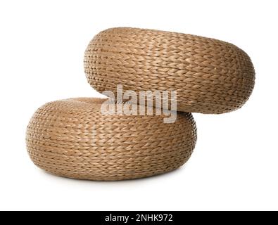 Two stylish wicker poufs on white background Stock Photo