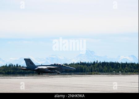 A Royal Australian Air Force F/A-18F Super Hornet taxis on the runway during RED FLAG-Alaska 22-3 on Eielson Air Force Base, Alaska, July 29, 2022. RF-A 22-3 is a Pacific Air Forces-sponsored exercise designed to provide realistic training in a simulated combat environment. Stock Photo