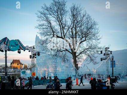 Facade of the Bonhomme Carnaval Ice Castle with people in line to visit it during winter day in Quebec city. Stock Photo