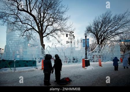 Facade of the Bonhomme Carnaval Ice Castle with people in line to visit it during winter day in Quebec city. Stock Photo