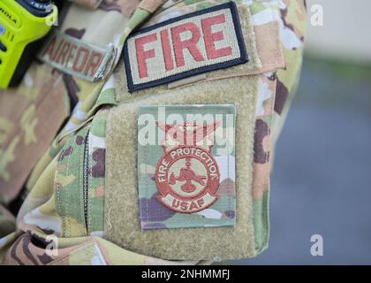 A 316th Civil Engineer Squadron firefighter wears the United States Air Force Fire Protection patch at Joint Base Andrews, Md., July 30, 2022. The 316th CES hosted the 2022 Fire Explorer Program cadets for a week-long training. Stock Photo