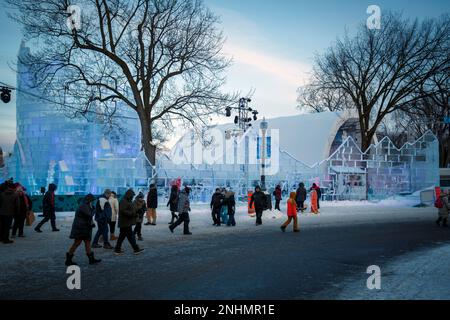 Facade of the Bonhomme Carnaval Ice Castle with people in line to visit it during winter day in Quebec city. Stock Photo