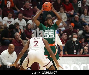 Blacksburg, Virginia, USA. 21st Feb, 2023. Miami (Fl) Hurricanes guard Wooga Poplar (55) looks to pass during the NCAA Basketball game between the Miami Hurricanes and the Virginia Tech Hokies at Cassell Coliseum in Blacksburg, Virginia. Greg Atkins/CSM/Alamy Live News Stock Photo