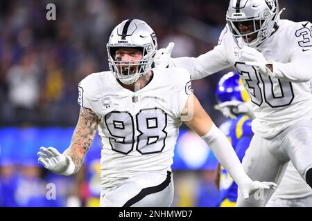 INGLEWOOD, CA - DECEMBER 08: Oakland Raiders defensive end Maxx Crosby (98)  celebrates a tackle with safety Duron Harmon (30) during the NFL game  between the Oakland Raiders and the Los Angeles