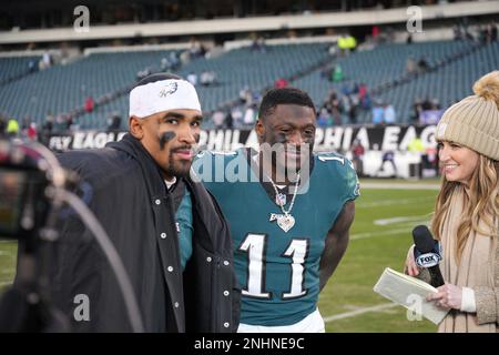 PHILADELPHIA, PA - DECEMBER 04: Fox Sports sideline reporter Erin Andrews  interviews Philadelphia Eagles quarterback Jalen Hurts (1) and Philadelphia  Eagles wide receiver A.J. Brown (11) during the game between the Tennessee