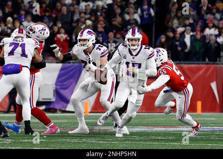 FOXBOROUGH, MA - DECEMBER 01: Buffalo Bills running back James Cook (28)  escapes a tackle during a game between the New England Patriots and the  Buffalo Bills on December 1, 2022, at