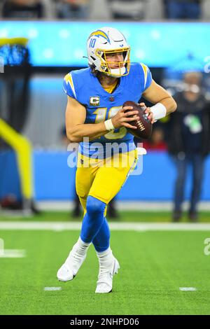 INGLEWOOD, CA - NOVEMBER 20: A fan holds up a sign for Los Angeles Chargers  quarterback Justin Herbert (10) on NBC Sunday Night Football during the NFL  regular season game between the