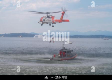 https://l450v.alamy.com/450v/2nhpkj9/a-member-of-the-coast-guard-maritime-safety-and-security-response-team-vertically-ascends-into-a-us-coast-guard-mh-60-jayhawk-helicopter-during-a-search-and-rescue-demonstration-in-seattle-for-fleet-week-aug-1-2022-fleet-week-seattle-is-a-time-honored-celebration-of-the-sea-services-and-provides-an-opportunity-for-the-citizens-of-washington-to-meet-sailors-marines-and-coast-guardsmen-as-well-as-witness-firsthand-the-latest-capabilities-of-todays-maritime-services-2nhpkj9.jpg