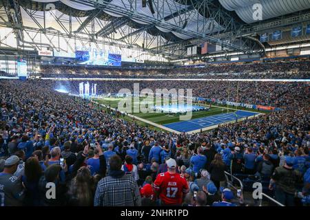 DETROIT, MI - NOVEMBER 24: Fans cheer as the Detroit Lions team runs onto  the field before the start of a regular season NFL football game between  the Buffalo Bills and the