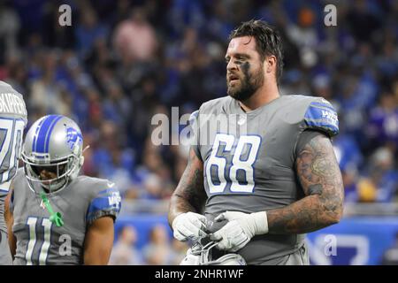 DETROIT, MI - NOVEMBER 24: The Detroit offensive players huddle together as  a play is called during a regular season NFL football game between the  Buffalo Bills and the Detroit Lions on