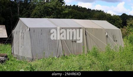 very big military tent in the field Stock Photo - Alamy