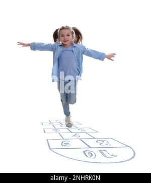 Cute little girl playing hopscotch on white background Stock Photo