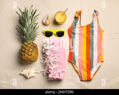 Flat lay composition with beach objects on sand Stock Photo