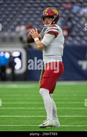 HOUSTON, TX - NOVEMBER 20: Washington Commanders defensive tackle Daron  Payne (94) warms up before t