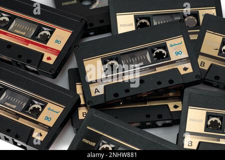Poznan, Poland - July 11, 2022 Close-up old cassette tapes on a table.Top view close up photography. Stock Photo