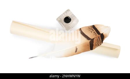 Feather pen, inkwell and scroll of parchment on white background, top view Stock Photo