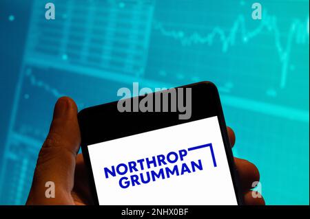 China. 19th Feb, 2023. In this photo illustration, the American multinational aerospace and defense technology company Northrop Grumman logo is seen displayed on a smartphone with an economic stock exchange index graph in the background. (Photo by Budrul Chukrut/SOPA Images/Sipa USA) Credit: Sipa USA/Alamy Live News Stock Photo
