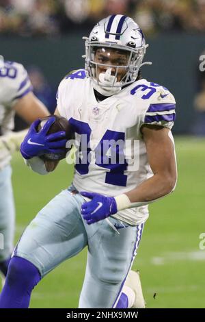 GREEN BAY, WI - NOVEMBER 13: Green Bay Packers safety Darnell Savage (26)  tackles Dallas Cowboys running back Tony Pollard (20) during a game between  the Green Bay Packers and the Dallas