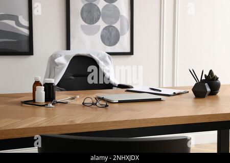 Modern doctor's workplace in stylish office. Interior design Stock Photo