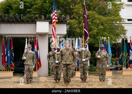 Command Sgt. Maj. Blake Wise accepts the colors for Troop Battalion at ...