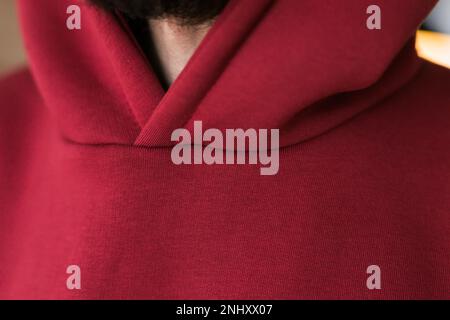 Hoodie texture. Close-up shot of sweatshirt hoodie textile warm fabric macro background Stock Photo