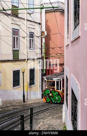 Lisbon, Very Steep Tram Of Gloria Restauradores. Graffiti On The Public ...