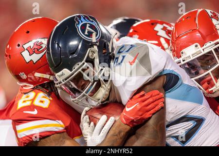 KANSAS CITY, MO - NOVEMBER 06: Kansas City Chiefs safety Deon Bush (26)  hits Tennessee Titans running back Hassan Haskins (25) on November 6th,  2022 at GEHA field at Arrowhead Stadium in