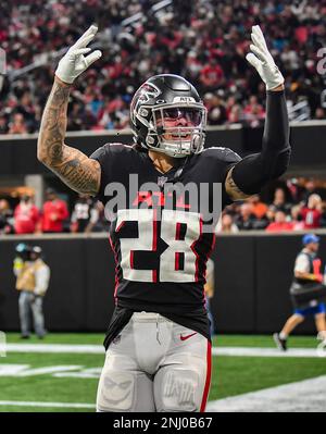 ATLANTA, GA – OCTOBER 30: Atlanta cornerback Isaiah Oliver (26) reacts  after a defensive touchdown during the NFL game between the Carolina  Panthers and the Atlanta Falcons on October 30th, 2022 at