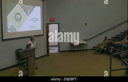 Darlene Pearson, a financial readiness counselor with the Army Community Service, teaches a class on financial literacy to U.S. Army Soldiers assigned to Headquarters and Headquarters Battalion, 3rd Infantry Division at the Army Education Center on Fort Stewart, Georgia, August 4, 2022. Financial literacy teaches Soldiers how to handle their income with a Thrift Savings Plan which focuses on retirement savings and investment, or what to allocate money for when undergoing a permanent change of station. Stock Photo