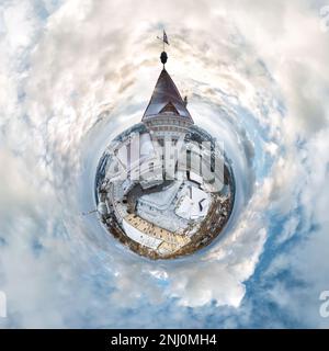 little planet and spherical aerial 360 panorama view on street ancient medieval castle with church and historic buildings with columns Stock Photo