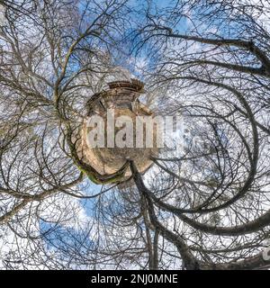 tiny planet in abandoned village near old house in blue sky with beautiful clouds. Transformation of spherical panorama 360 degrees. Spherical abstrac Stock Photo