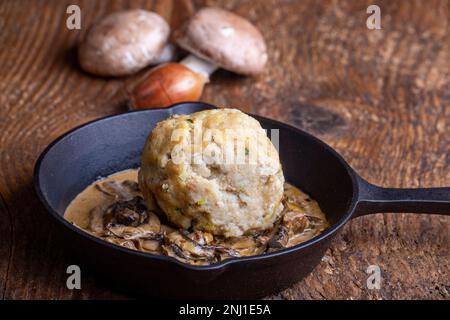 Bavarian Bread Dumpling In Mushroom Sauce Stock Photo