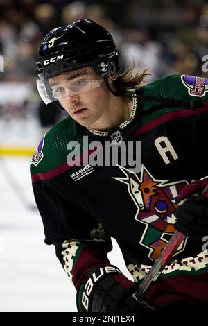 Arizona Coyotes right wing Clayton Keller skates to the puck against the  New York Rangers during the second period of an NHL hockey game Thursday,  Dec. 16, 2021, in Glendale, Ariz. The