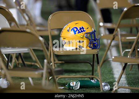 LOUISVILLE, KY - OCTOBER 22: A Louisville helmet sits on the sideline  during a college football game between the Pittsburgh Panthers and Louisville  Cardinals on October 22, 2022 at Cardinal Stadium in