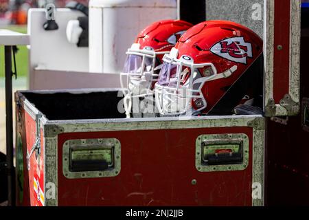 Kansas City Chiefs helmets sit on a cooler during the first half of an NFL  football game against the Indianapolis Colts, Sunday, Sept. 25, 2022, in  Indianapolis. (AP Photo/Michael Conroy Stock Photo 