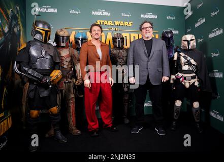 Pedro Pascal and director Jon Favreau during a photo call at Piccadilly Circus, London, for The Mandalorian, before it is released on Disney+ from March 1. Picture date: Wednesday February 22, 2023. Stock Photo