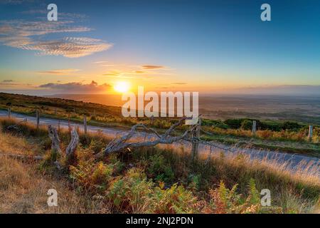 Sunset over the Lulworth ranges in the Purbeck Hills in Dorset Stock Photo