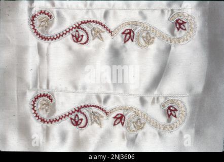 Traditional Embroideries of India. Embroidery in India has come a long way. As fashion trends changed with time, Indian Embroidery adapted to the new climate and managed to remain elegant and sophisticated. While each embroidery technique possesses its speciality, one thing is for certain, each one of them makes a serious style statement. Embroidery in India includes dozens of embroidery styles that vary by region and clothing styles. Designs in Indian embroidery are formed on the basis of the texture and the design of the fabric and the stitch. Stock Photo