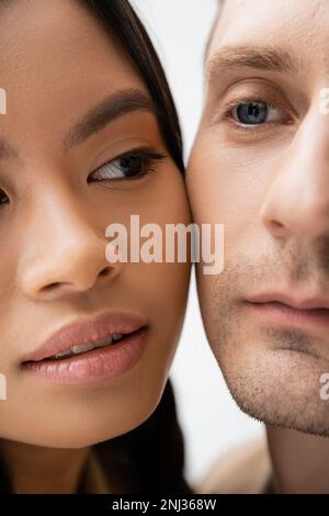 close up view of cropped interracial couple isolated on white,stock image Stock Photo