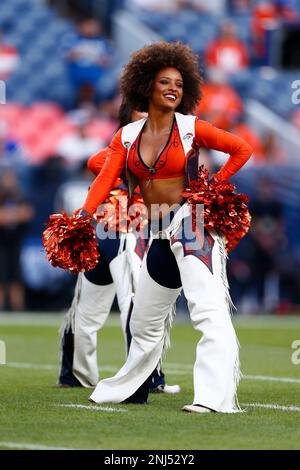 DENVER, CO - OCTOBER 06: A Denvers Broncos Cheerleader preforms during an  NFL game between the Indianapolis Colts and the Denver Broncos on October  06, 2022 at Empower Field at Mile High