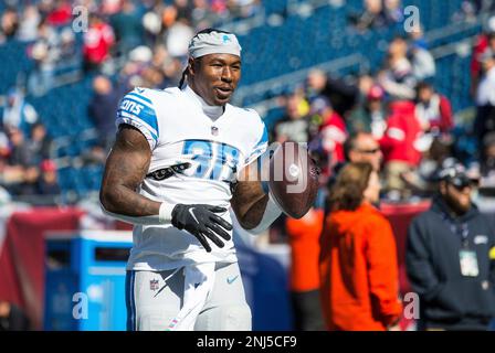 FOXBOROUGH, MA - OCTOBER 09: Detroit Lions running back Jamaal Williams  (30) interacts with fans prior to the NFL game between Detroit Lions and  New England Patriots on October 9, 2022, at