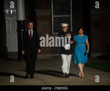 The hosting official and guest of honor arrive at the start of the Friday Evening Parade at Marine Barracks Washington D.C., Aug 08, 2022. The hosting official for the evening was General David H. Berger, 38th Commandant of the Marine Corps, and the guest of honor was the Honorable Erik K. Raven, Under Secretary of the Navy. Stock Photo