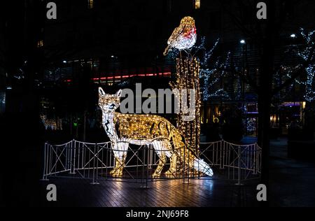 A Fox and Robin public Christmas lights and decorations at More Place London near Tower Bridge in London. Stock Photo
