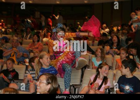 CLOWNING 015 LH .JPG Clown Michelle Musser climbs the seating