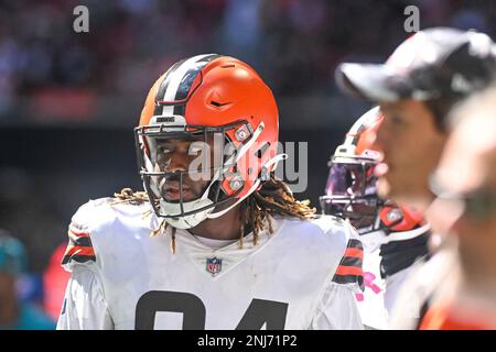 Atlanta Falcons defensive tackle Timmy Horne (93) and wide receiver Drake  London (5) walk off the field after an NFL football game against the  Cleveland Browns, Sunday, Oct. 2, 2022, in Atlanta.