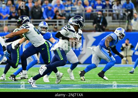 DETROIT, MI - OCTOBER 02: Seattle Seahawks QB Geno Smith (7) makes a throw  while falling to the ground but was flagged for intentional grounding  during the game between Seattle Seahawks and