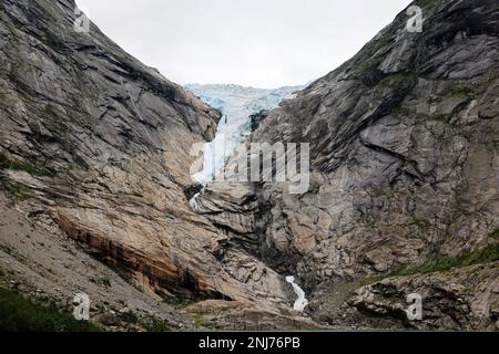 Hiking in the Area of  the Glacier Briksdal, Briksdalsbreen,  in Norway, Scandinavia, Europe Stock Photo