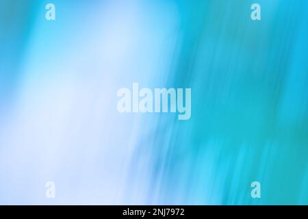 Sunshine rays glowing light blurred motion out of focus background. Light blur radiance on blue sky background. Stock Photo
